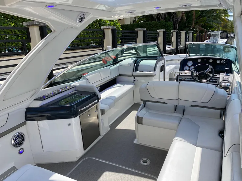 Slide: The Image of 2021 Formula 310 Bowrider I/O with luxurious seating and modern dashboard. - 17