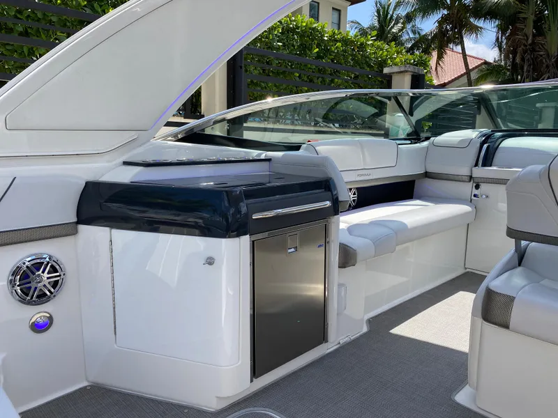 Slide: The Image of 2021 Formula 310 Bowrider I/O interior with sleek seating and modern amenities. - 18