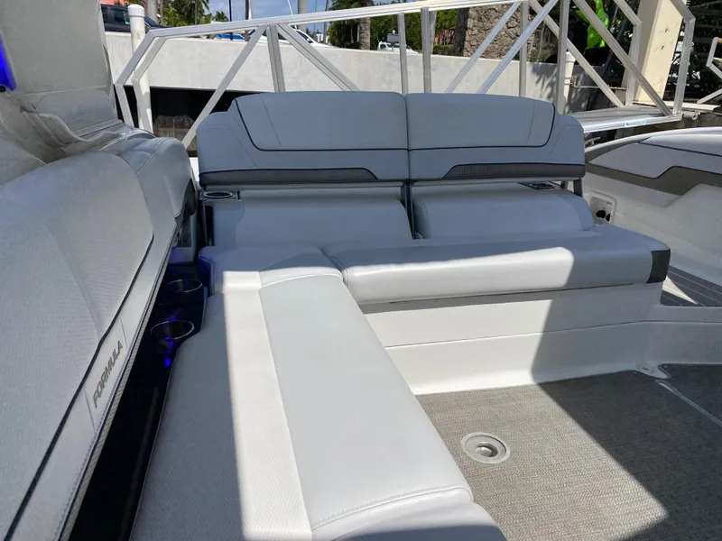 Slide: The Image of 2021 Formula 310 Bowrider I/O interior seating with modern design and comfortable upholstery. - 19
