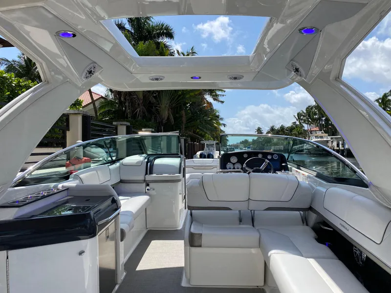 Slide: The Image of Luxurious 2021 Formula 310 Bowrider I/O boat interior with plush seating and modern design. - 20