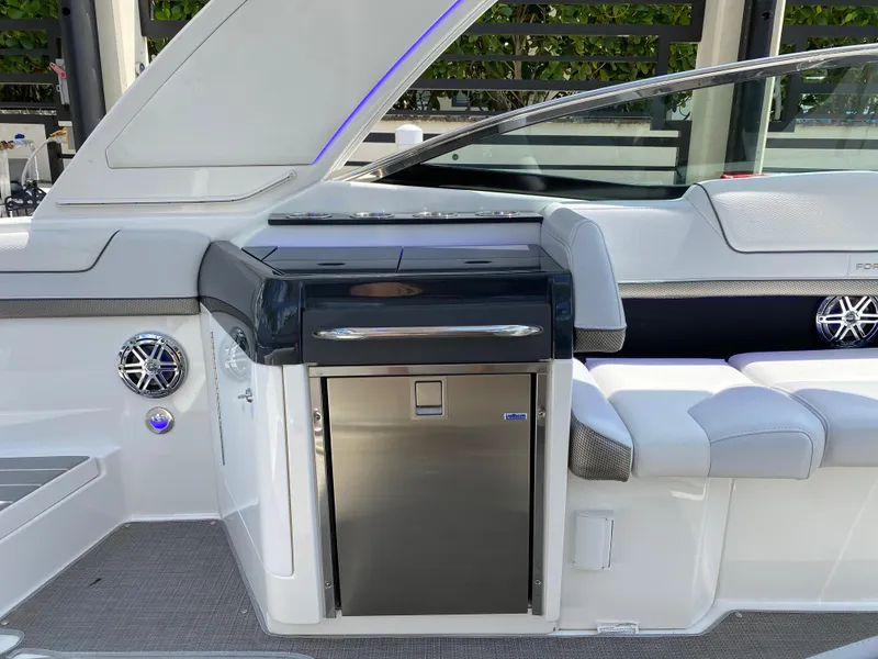 Slide: The Image of Interior of 2021 Formula 310 Bowrider I/O, featuring sleek seating and modern amenities. - 21