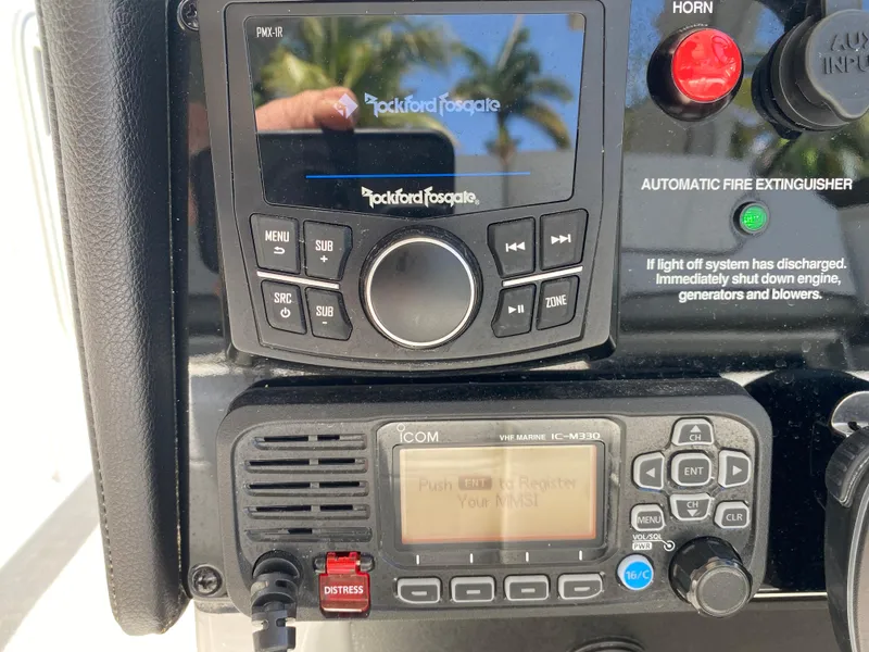 Slide: The Image of Control panel of a 2021 Formula 310 Bowrider I/O with Rockford Fosgate audio system. - 31