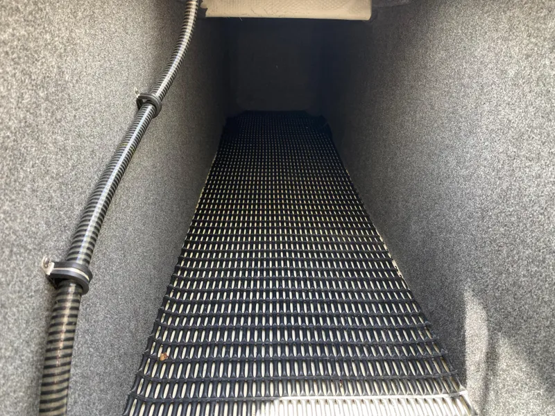 Slide: The Image of Interior storage compartment of 2021 Formula 310 Bowrider I/O boat. - 36