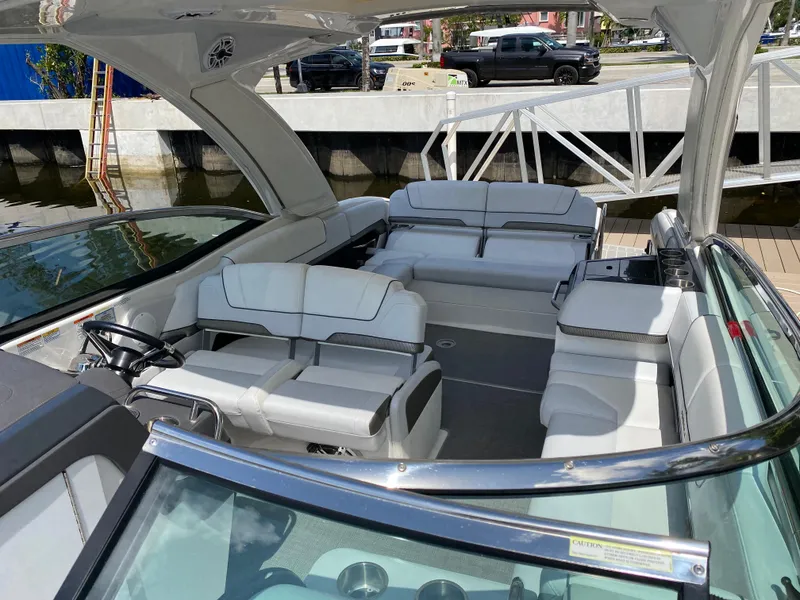 Slide: The Image of 2021 Formula 310 Bowrider I/O with spacious seating and modern interior design. - 39