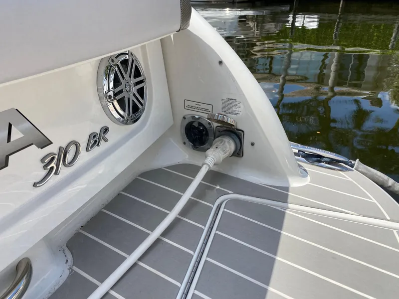 Slide: The Image of 2021 Formula 310 Bowrider I/O boat with power connection on deck. - 5