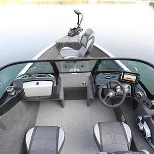 Slide: The Image of 2025 Lund Rebel XL 1650 XL SS boat interior with seating and steering console. - 12