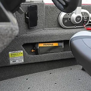 Slide: The Image of 2025 Lund ADVENTURE 1675 SS interior with storage compartment and steering wheel. - 12