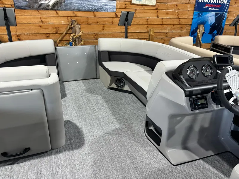 Slide: The Image of 2025 Harris Cruiser 210 SL interior with modern seating and sleek dashboard design. - 9