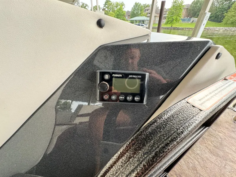 Slide: The Image of Control panel on 2019 Crest Caribbean 250 SLRC boat with Fusion MS-RA55 stereo. - 16