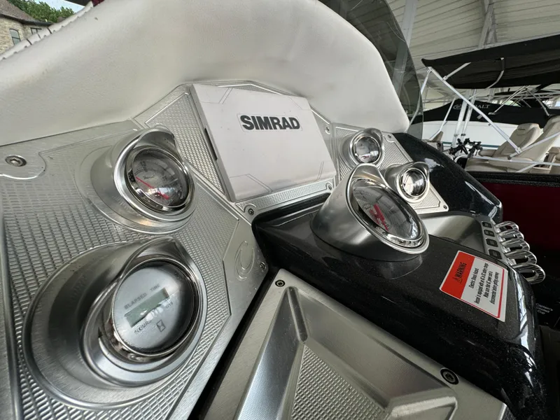 Slide: The Image of 2019 Crest Caribbean 250 SLRC dashboard with Simrad display and gauges. - 6