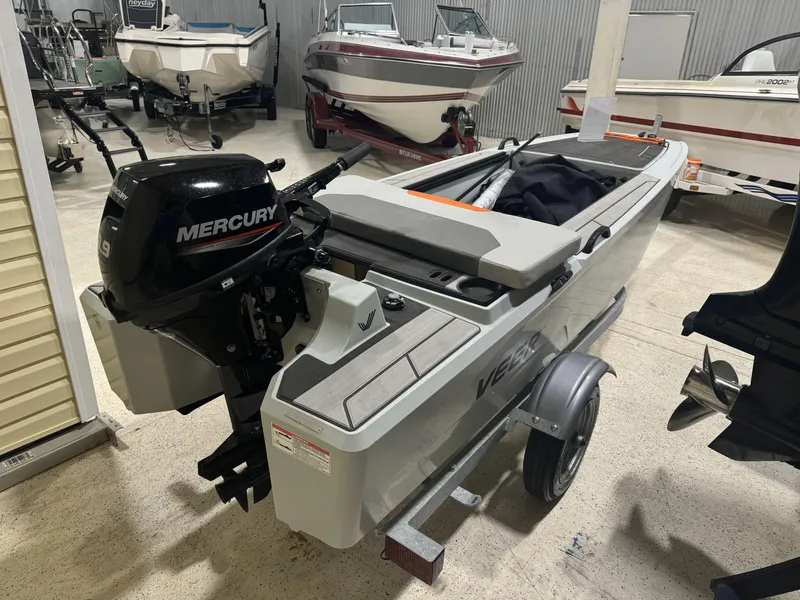 Slide: The Image of 2023 Veer V13 boat with Mercury engine in showroom. - 3