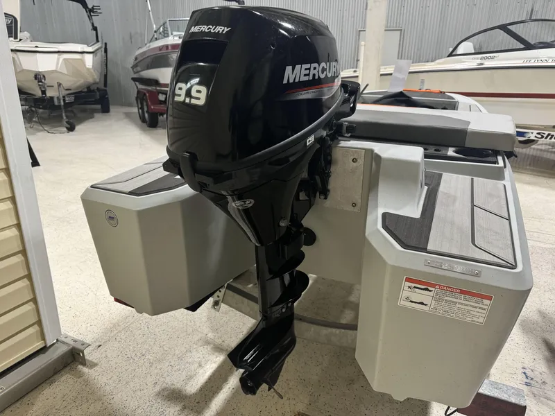 Slide: The Image of Veer V13 boat with Mercury 9.9 outboard motor, 2023 model, in showroom. - 4