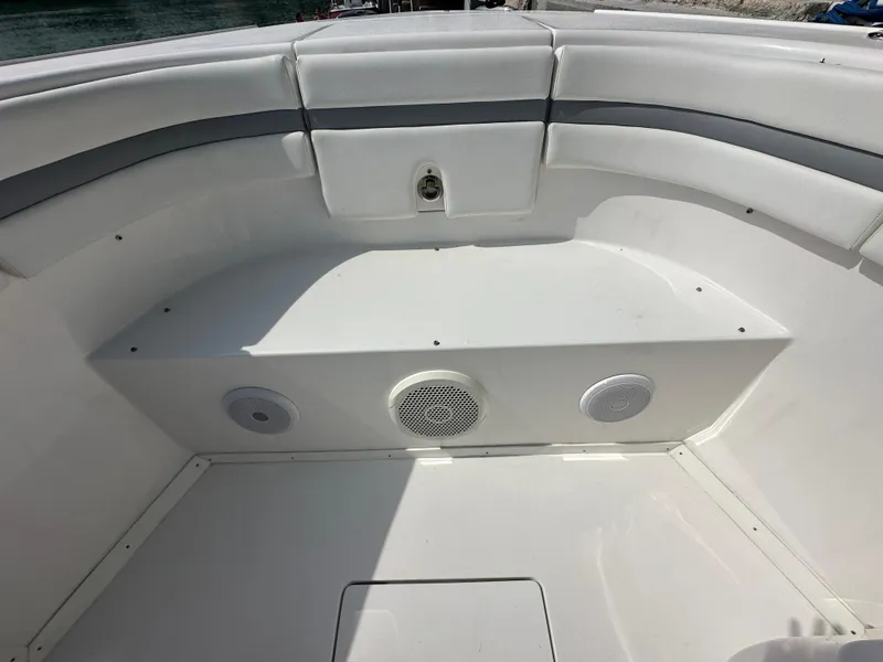 Slide: The Image of 2015 Intrepid 400 Center Console boat interior with seating and speakers. - 12