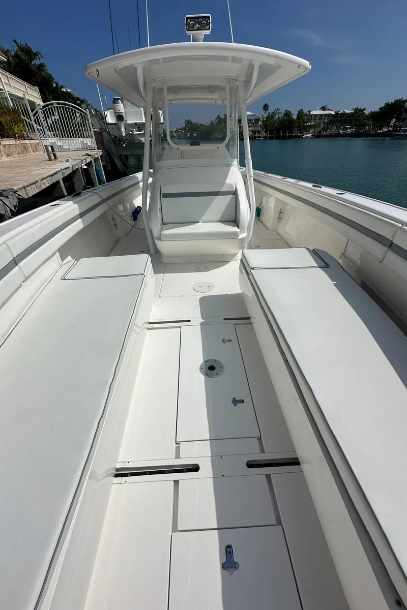 Slide: The Image of 2015 Intrepid 400 Center Console boat with spacious deck and sleek design. - 19