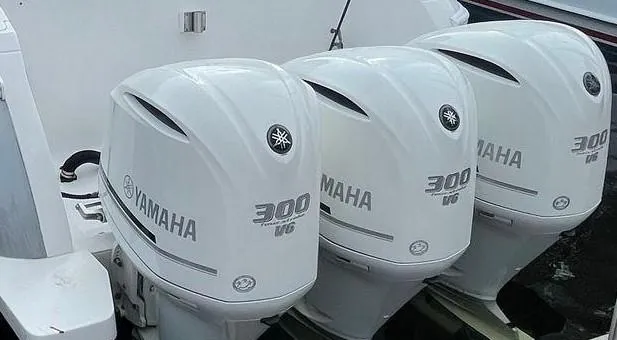 Slide: The Image of Three Yamaha 300 V6 outboard engines on a 2015 Intrepid 400 Center Console boat. - 4