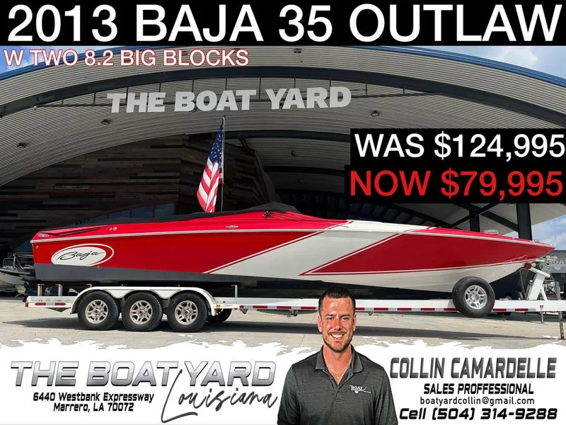Slide: The Image of 2013 Baja 35 Outlaw boat for sale, red and white, discounted price. - 1