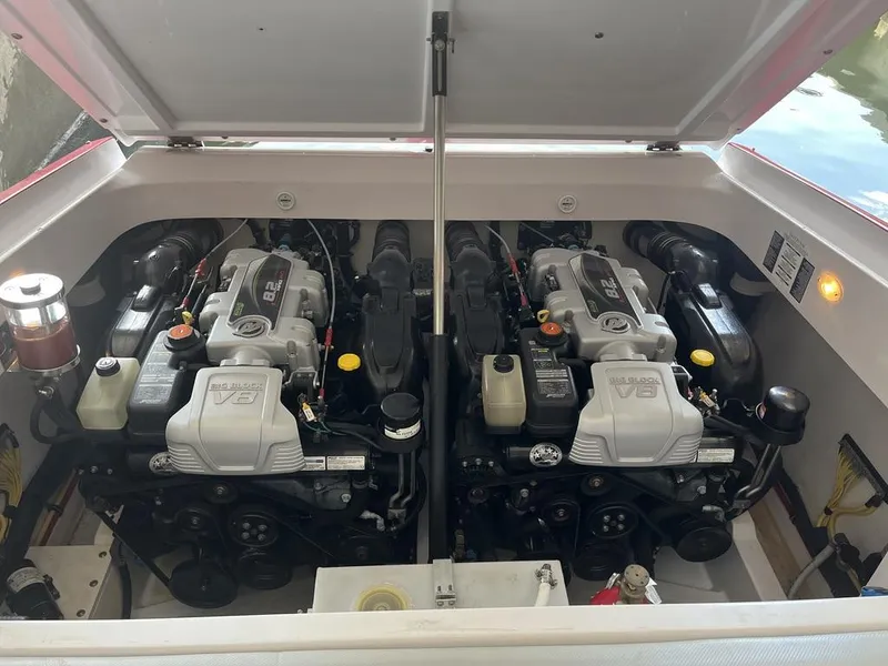 Slide: The Image of 2013 Baja 35 Outlaw boat engine compartment with dual V8 engines. - 17