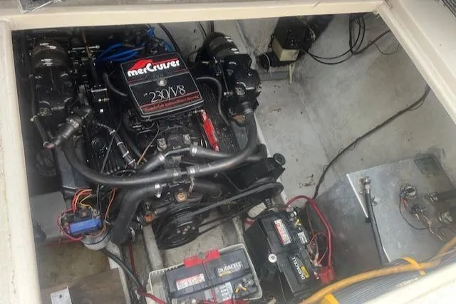 Slide: The Image of Engine compartment of 1988 Regal 277 Commodore XL with MerCruiser 230 V8 engine. - 26