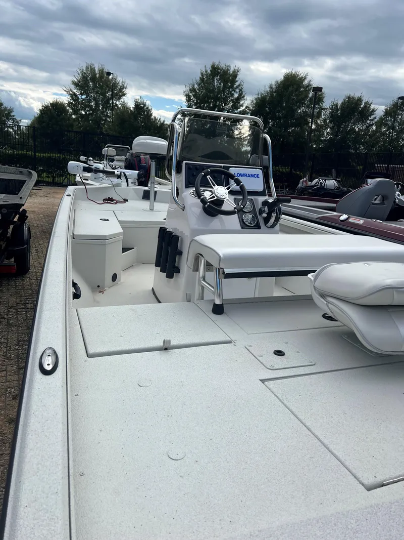 Slide: The Image of 2024 Ranger RB190 boat with sleek design, white deck, and modern console. - 3