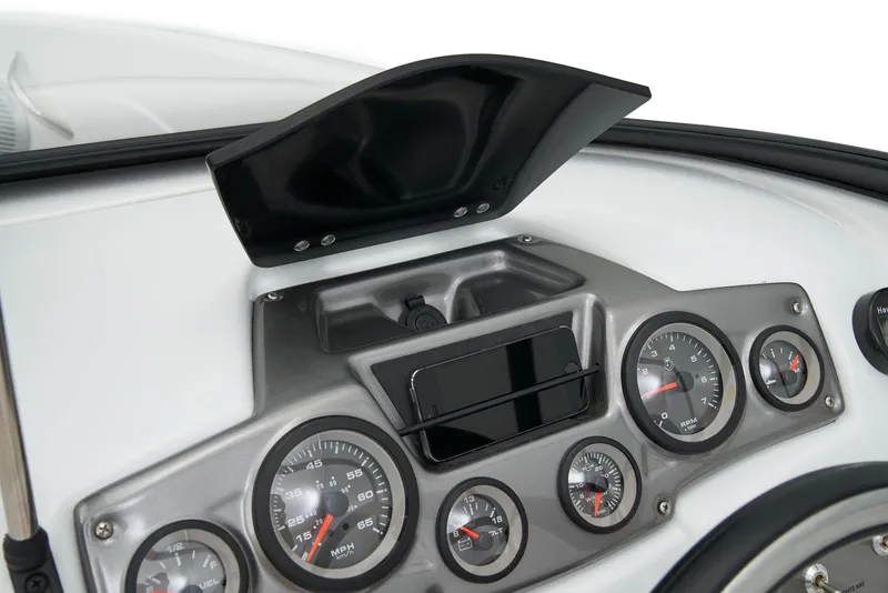 Slide: The Image of 2024 Tahoe 200 S boat interior with white and blue seating. - 14