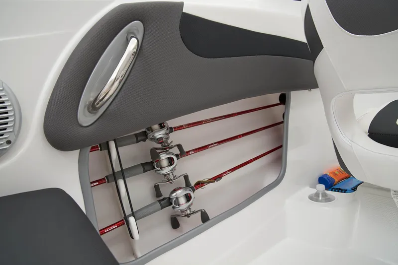 Slide: The Image of 2024 Tahoe 200 S boat interior with steering wheel and dashboard controls. - 19