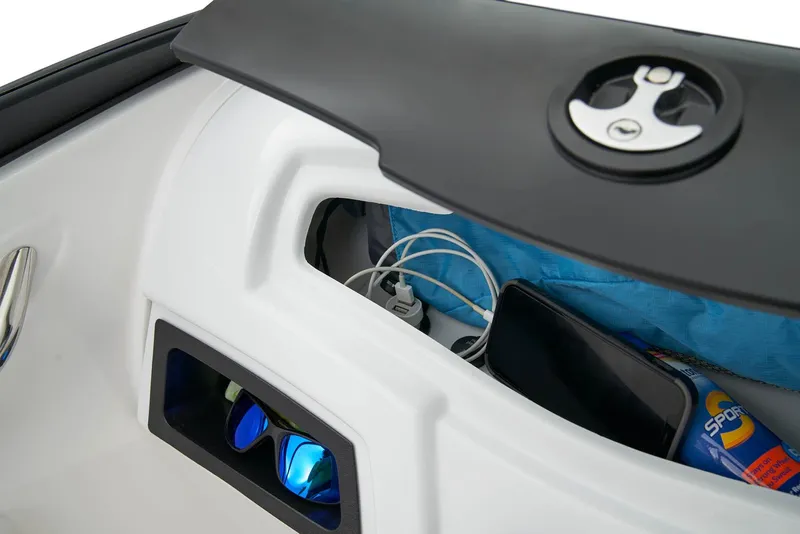 Slide: The Image of 2024 Tahoe 200 S boat interior with modern dashboard and comfortable seating. - 20