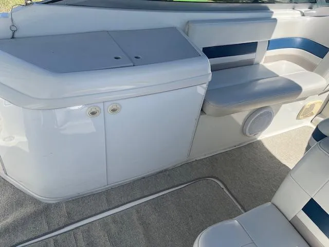 Slide: The Image of Interior of 1999 Formula 280 Bowrider boat with seating and storage. - 5