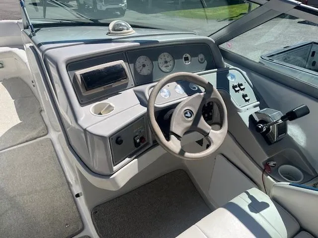 Slide: The Image of 1999 Formula 280 Bowrider dashboard with steering wheel and controls. - 6