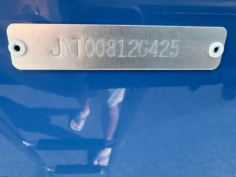 Slide: The Image of 2025 NauticStar 24 OSL boat hull identification number plate. - 8