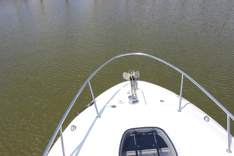 Slide: The Image of Bow view of 2012 Sea Ray 280 Sundancer on calm water. - 19