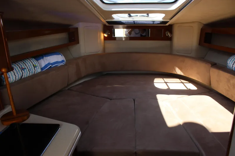 Slide: The Image of Interior cabin of 2012 Sea Ray 280 Sundancer with skylight and seating area. - 30