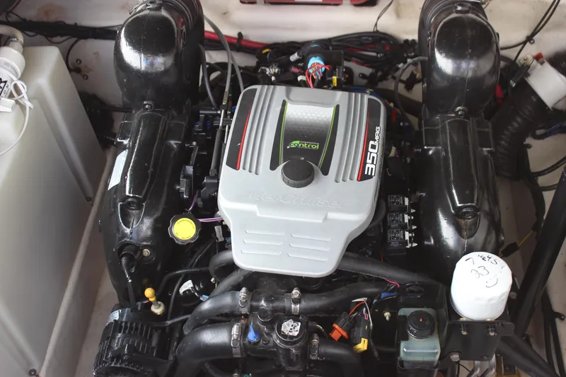 Slide: The Image of Engine of 2012 Sea Ray 280 Sundancer boat, featuring a powerful 350 MAG motor. - 38