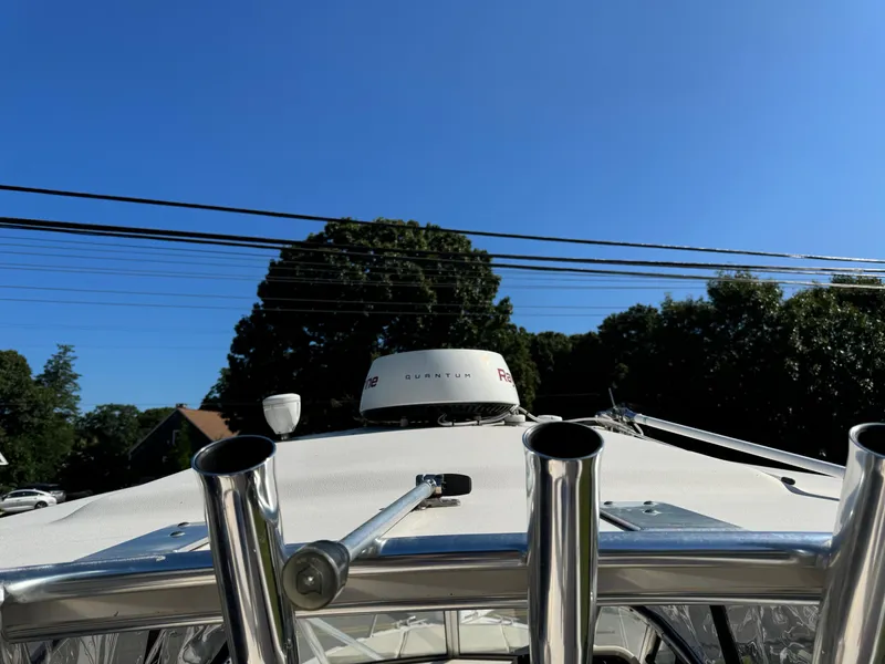 Slide: The Image of 2009 Grady-White 228 Seafarer boat with radar, clear sky background. - 12