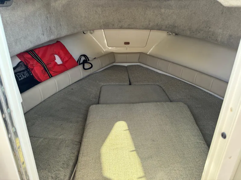 Slide: The Image of Interior cabin of 2009 Grady-White 228 SEAFARER boat with cushions and life jacket. - 14