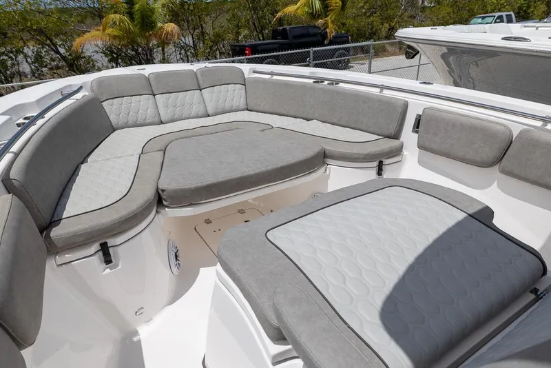 Slide: The Image of 2024 Sea Fox 288 Commander boat with spacious, cushioned seating area. - 15