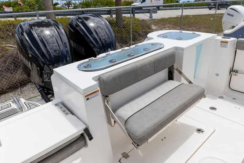Slide: The Image of 2024 Sea Fox 288 Commander boat with Yamaha engines and foldable seating. - 7