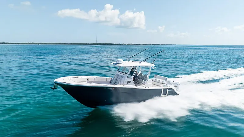 Slide: The Image of 2024 Sea Fox 328 Commander cruising on open ocean waters. - 0