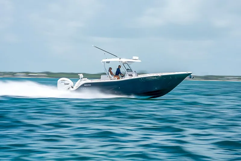 Slide: The Image of 2024 Sea Fox 328 Commander speeding on open water. - 9