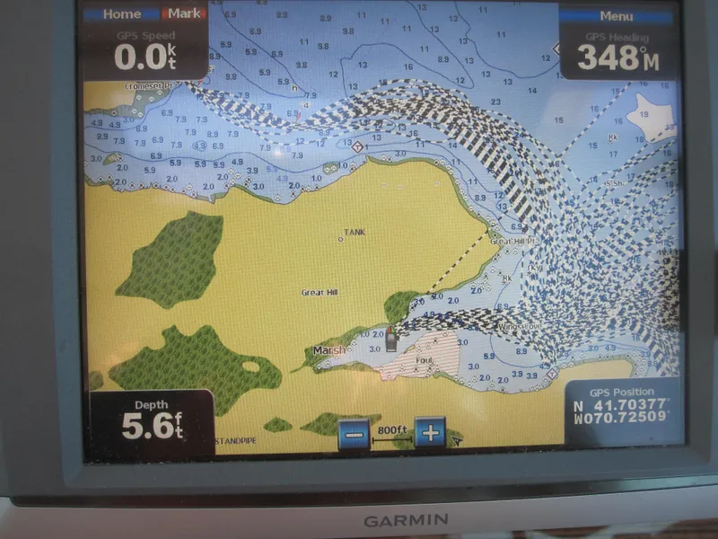 Slide: The Image of Garmin GPS display showing nautical chart with depth and position coordinates. - 34