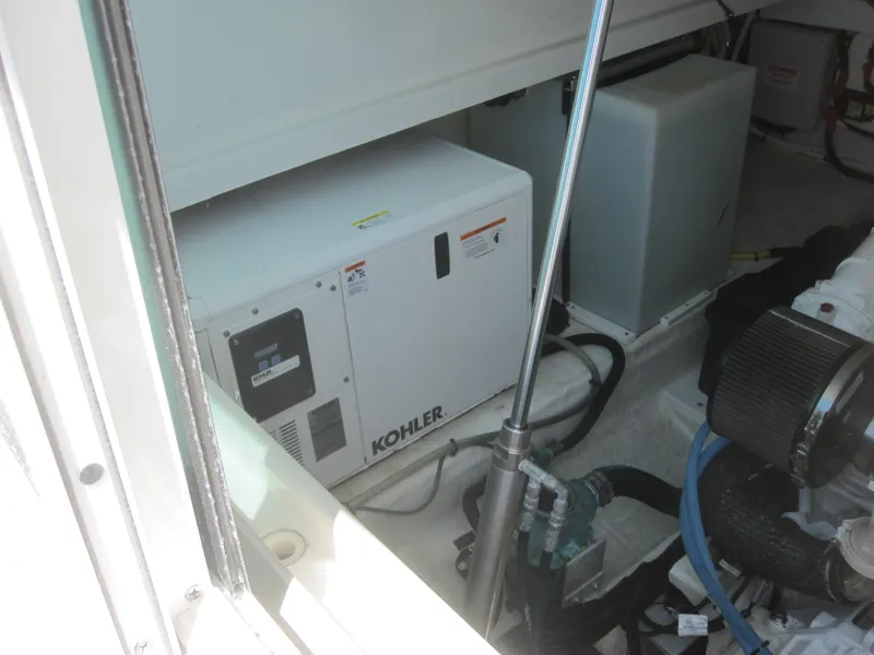 Slide: The Image of 2014 Back Cove 34 engine room with Kohler generator. - 37