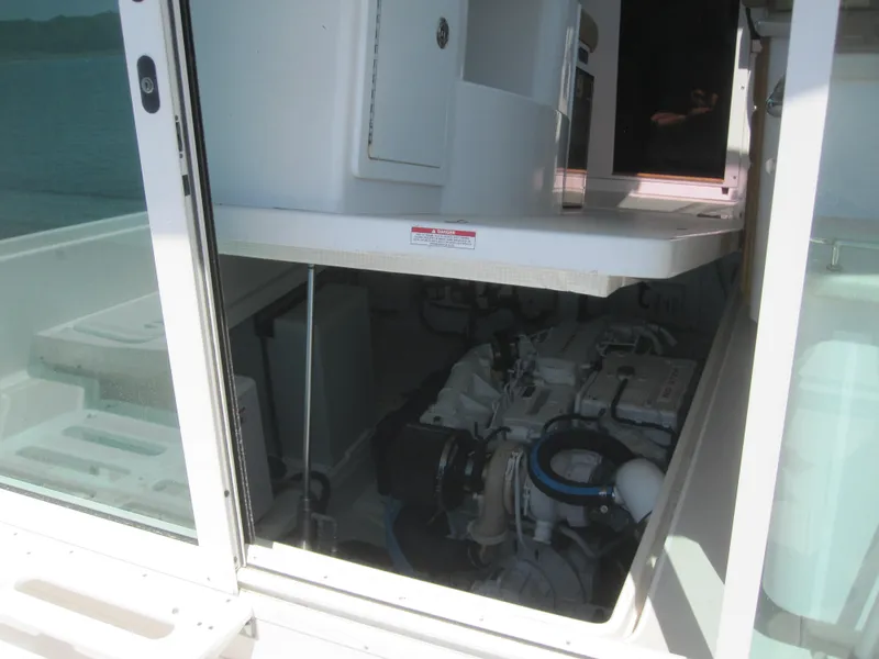 Slide: The Image of Engine compartment of 2014 Back Cove 34 Hard Top/Hard Back boat. - 40