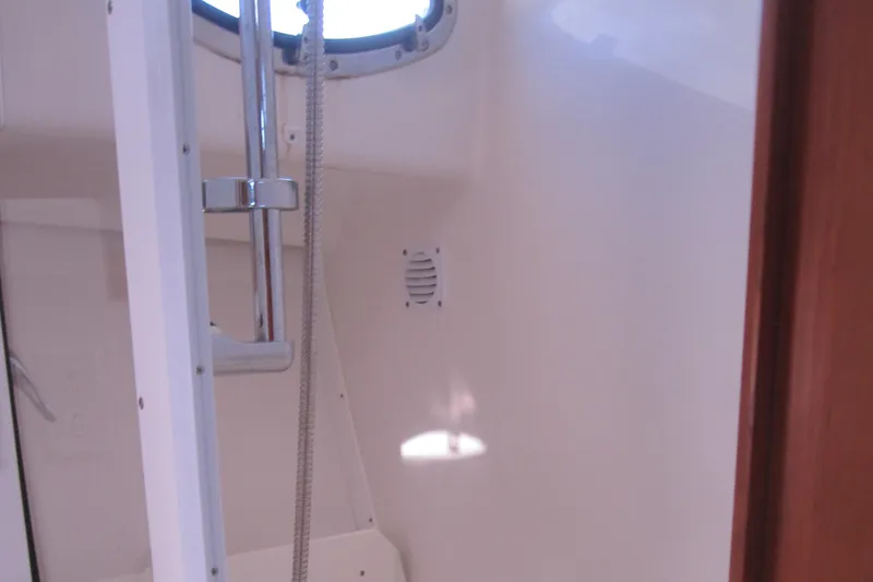 Slide: The Image of Interior shower area of 2014 Back Cove 34 Hard Top/Hard Back boat. - 48