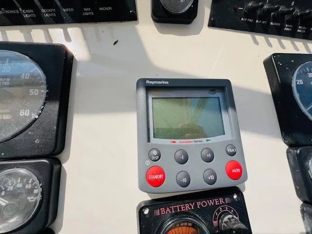 Slide: The Image of Control panel of a 2006 Carolina Classic 28 boat with Raymarine display. - 10