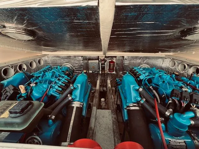 Slide: The Image of 2006 Carolina Classic 28 engine compartment with dual blue engines. - 18