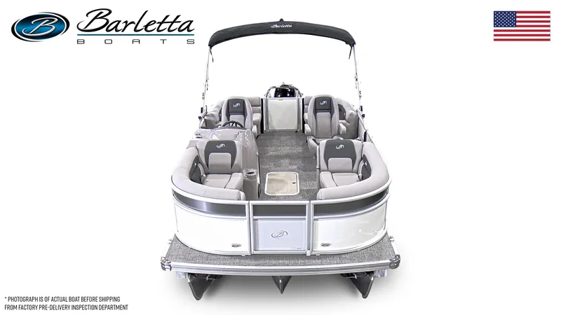 Slide: The Image of 2025 Barletta ARIA 20QC pontoon boat, front view, with seating and canopy, USA flag. - 6