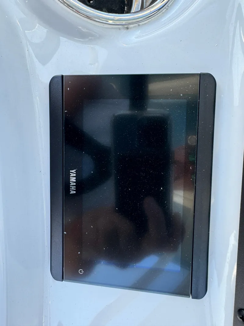 Slide: The Image of Yamaha display screen on 2025 Pathfinder 2500 Hybrid boat console. - 19