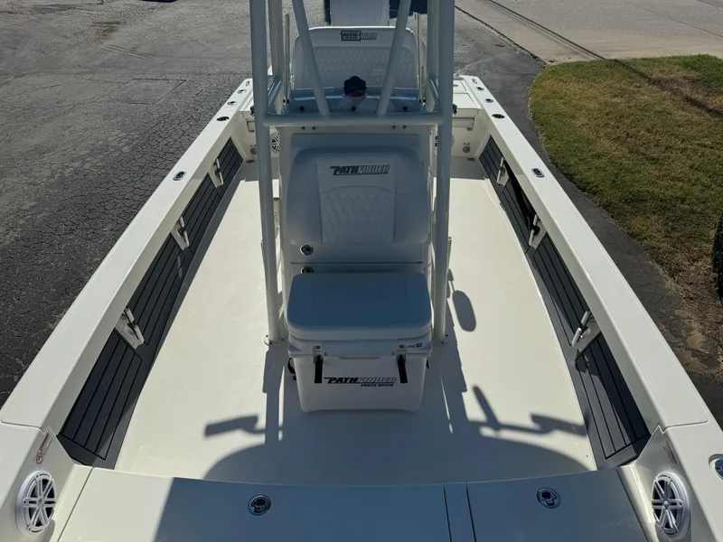 Slide: The Image of 2025 Pathfinder 2500 Hybrid boat interior with center console and seating. - 22