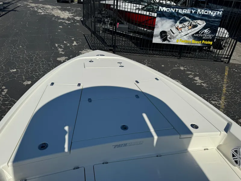 Slide: The Image of Pathfinder 2500 Hybrid 2025 boat deck, showcased at a dealership event. - 35