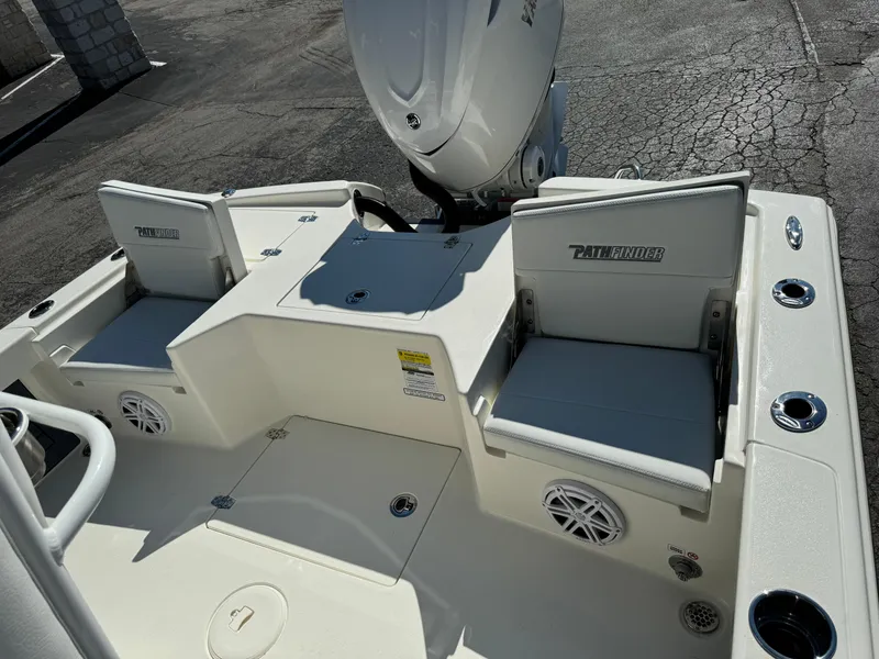 Slide: The Image of 2025 Pathfinder 2500 Hybrid boat interior with seating and motor, showcasing modern design. - 47