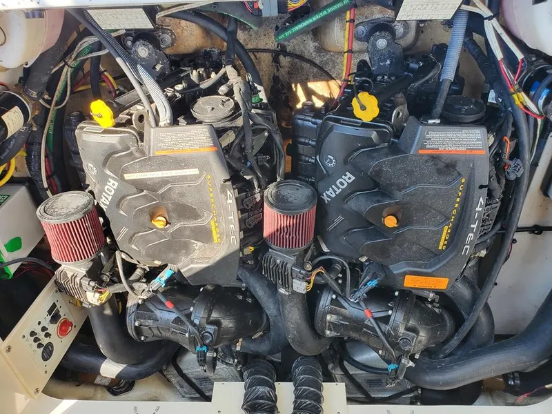 Slide: The Image of 2017 Chaparral Vortex 243 VRX engine compartment with dual Rotax engines. - 11